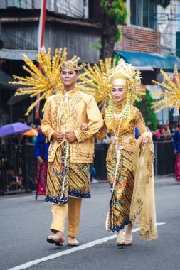 Indonesian with a traditional cloth from Jakarta in 4th BEN Carnival