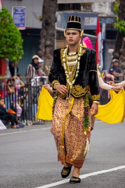 An asian with traditional cloth from jogja at 4th BEN Carnival