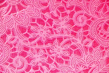 Dekoratif pembe kabartmalı çiçek deseni. Karmaşık detaylar ve desenli bir yüzey. Süslü tasarım, dekorasyon, el işleri, davetiyeler ve grafik tasarım için yumuşak, sanatsal bir arkaplan yaratıyor..