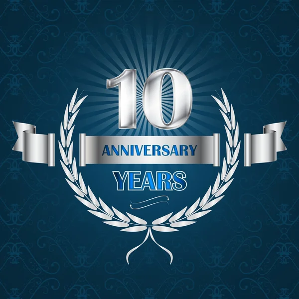 10 year anniversary emblem with ribbon and laurel wreath. — Stock Vector