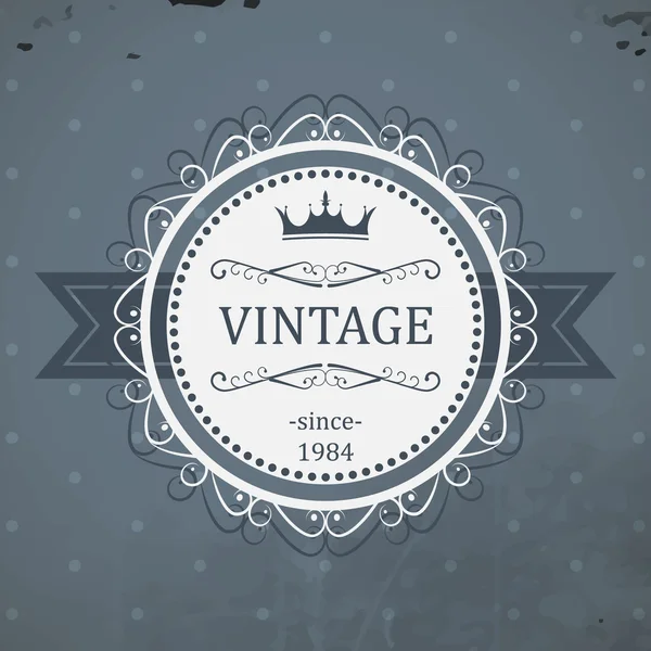 Round vintage label with ribbon, royal crown and grunge background. Vector illustration. — Stock Vector