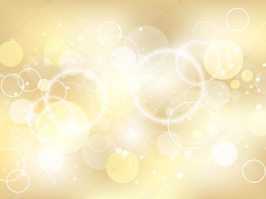 Golden abstract background with lights effect and bubbles.