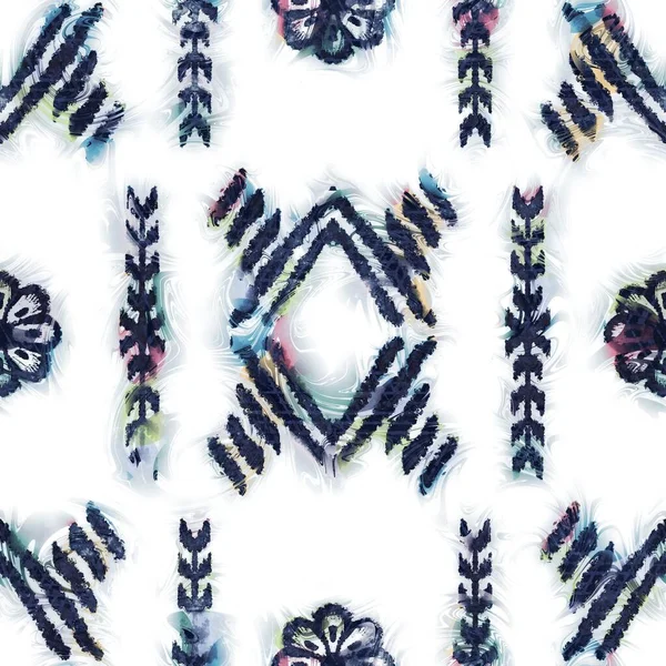 Seamless navy and white tribal rug motif pattern.