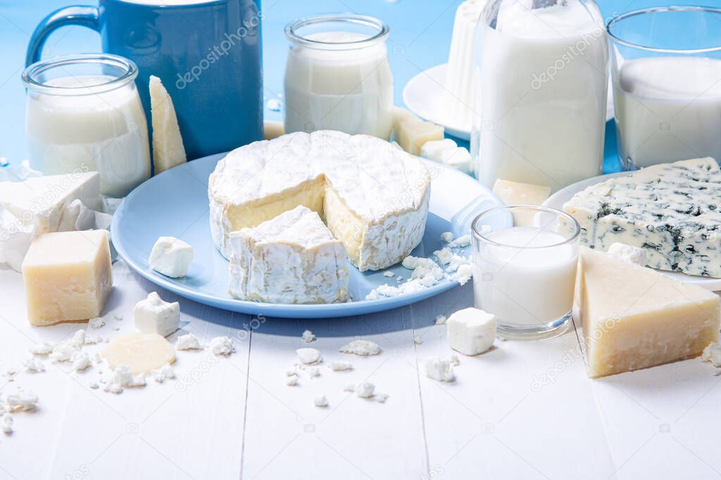 Close up view of dairy products in wooden withe background with copy space. 