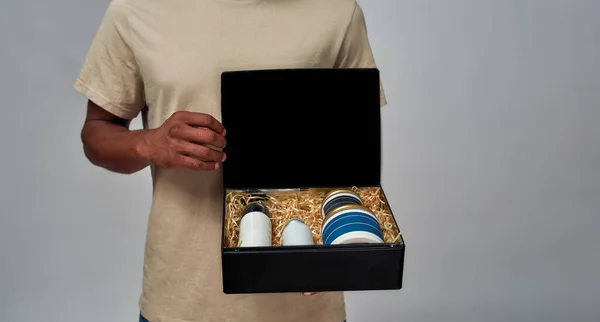 Person displaying a selection of makeup goods — Stock Photo, Image