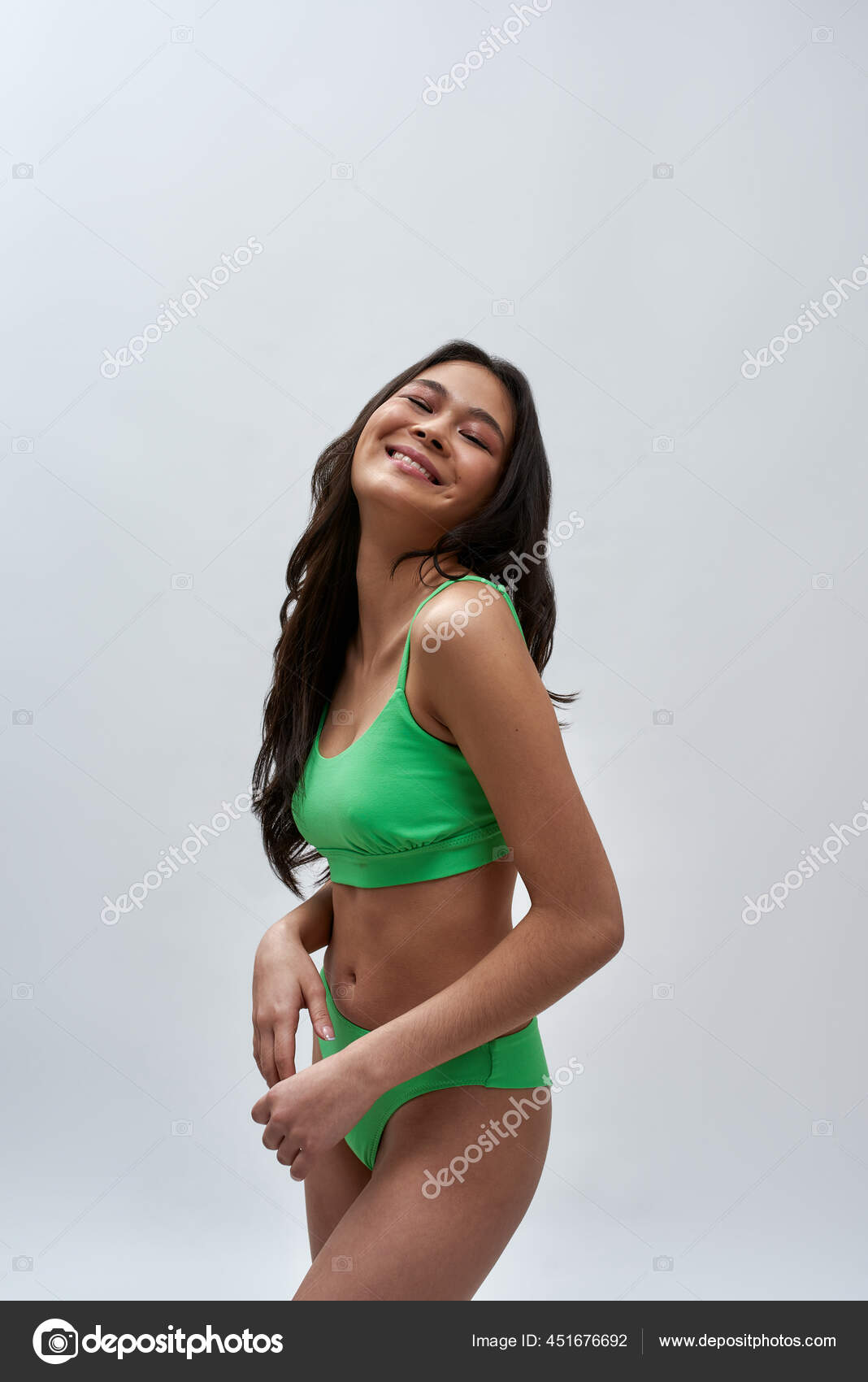 Beautiful curvy young female model wearing yellow underwear