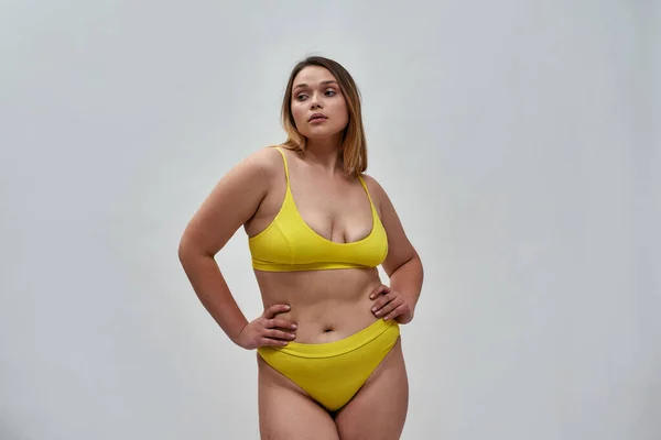 Attractive girl wearing yellow underwear Stock Photo by ©VelesStudio  172467634