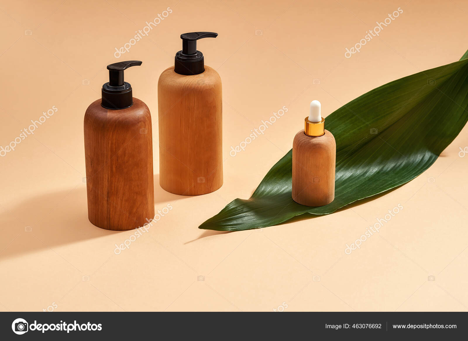 Download Reusable Eco Friendly Wooden Bottles For Liquid Soap And Shampoo With Pumps And Dropper On Beige Background With Green Leaf Stock Photo Image By C Lanastock 463076692