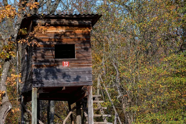 Close up of hunting tower in autumn forest — Stock Photo, Image