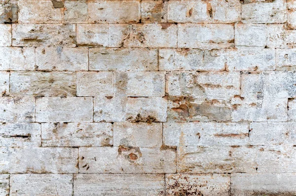Primer plano de ladrillos blancos antiguos de fondo de textura de pared de piedra — Foto de Stock