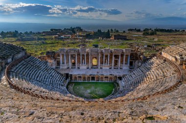 Roman amphitheater in the ruins of Hierapolis, in Pamukkale, Turkey. clipart