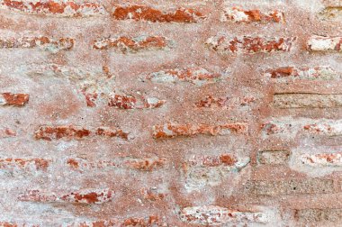 Kırmızı tuğla desenli taş duvarı kapat