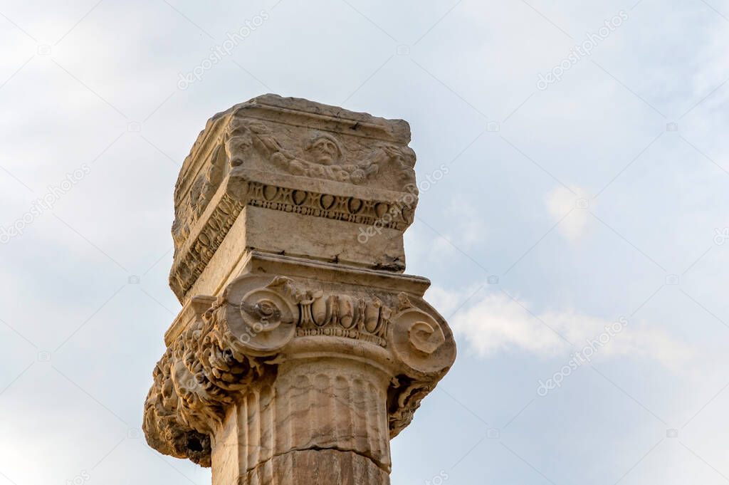 Close up of Ionic order column chapiter against blue sky