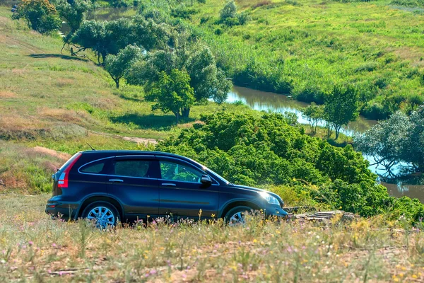 Auto travel in village — Stock Photo, Image