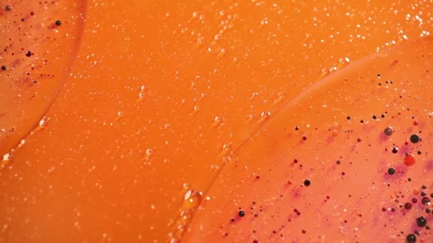 Mischen von Öl, Wasser und Tinte für einen schönen Abstrakt — Stockvideo