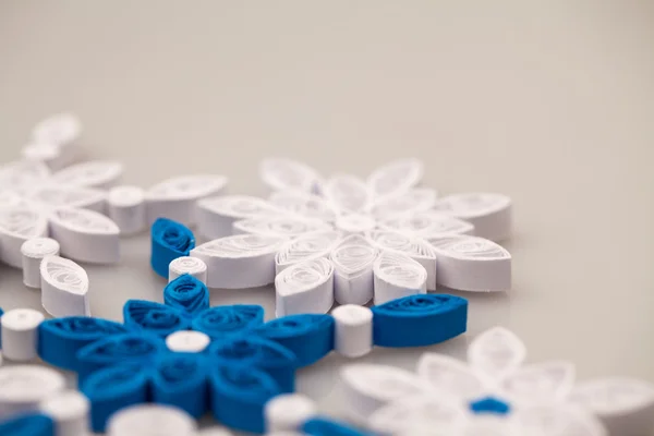 Paper snowflakes made with quilling technique - macro details — Stock Photo, Image