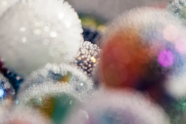 Abstract underwater composition with colorful glass balls, bubbles and light — Stock Photo, Image