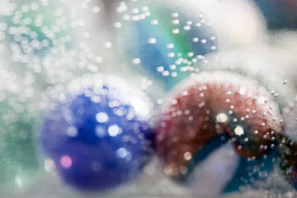 Abstract underwater composition with colorful glass balls, bubbles and light — Stock Photo, Image