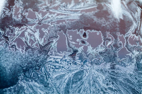 Ice flowers on glass - texture and background. High resolution and sharp, beautiful details