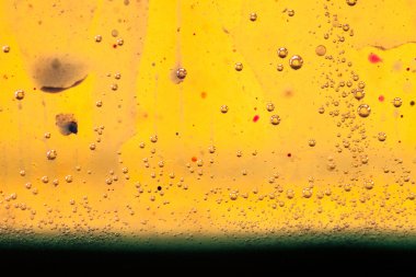 Yağ, su ve kabarcıkları ile renkli mürekkep karışımı ile soyut kompozisyon