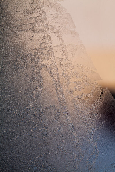 Ice flowers on glass - texture and background. High resolution and sharp, beautiful details
