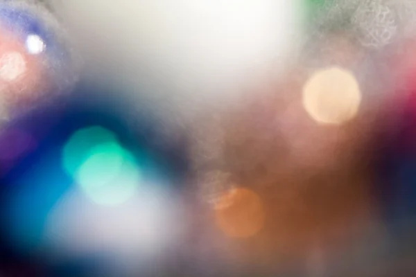 Sfondo astratto con bokeh. Luci e ombre sfocate, luci natalizie — Foto Stock