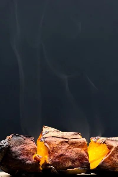 Baked pumpkin slice with steam — Stock Photo, Image