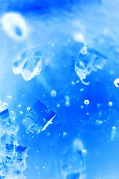 Abstract composition with sugar cubes in a jar with sweetness (inverted colors). It looks like water with bubbles and ice cubes — Stock Photo, Image