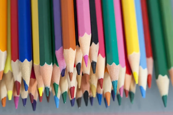 Group of sharp colored pencils with white background and reflexions — Stock Photo, Image