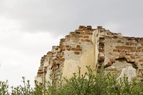 Parts of a ruined house with dramatic sky - different textures
