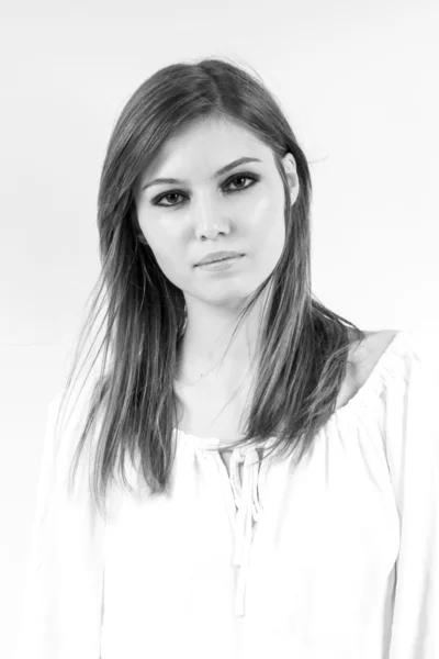 Beautiful caucasian girl wearing a white blouse with light grey background — Stock Photo, Image