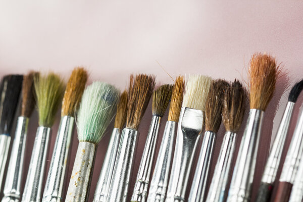 Set of different paintbrushes with white background
