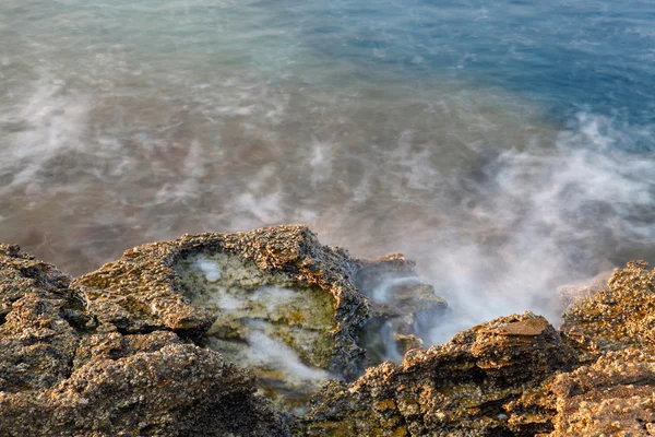 Aegean shore in Greece, Thassos island - waves and rocks - long exposure photography — Stock Photo, Image