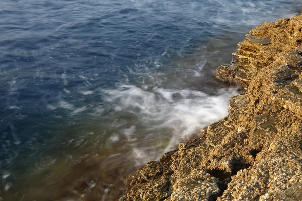 Aegean shore in Greece, Thassos island - waves and rocks - long exposure photography — Stock Photo, Image