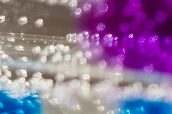 Abstract composition with underwater tubes with colorful jelly balls inside and bubbles — Stock Photo, Image