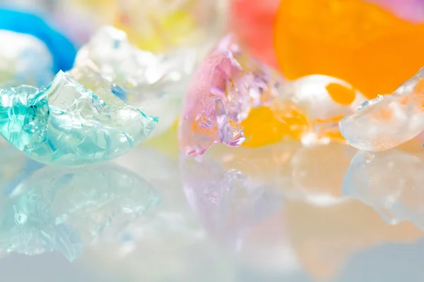 Texturas abstractas y patrones de bolas de gelatina rotas con reflejos — Foto de Stock