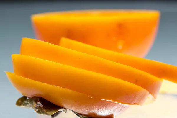 Persimmon slices - texture — Stock Photo, Image