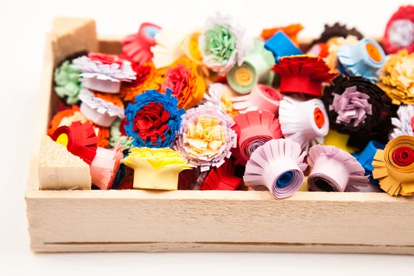 Small, colorful paper flowers — Stock Photo, Image