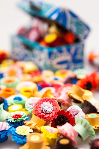 Small, colorful paper flowers — Stock Photo, Image