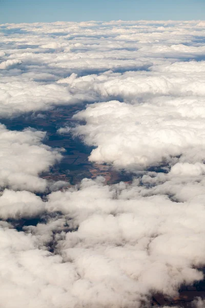 Beautiful, dramatic clouds and sky viewed from the plane — Stock Photo, Image