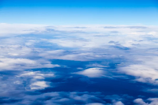 Beautiful, dramatic clouds and sky viewed from the plane — Stock Photo, Image