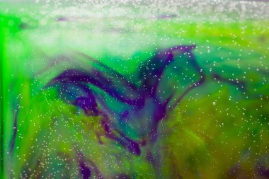 Mürekkep ve küçük kabarcıklar ile soyut kompozisyon. Güzel arka plan, doku ve renk