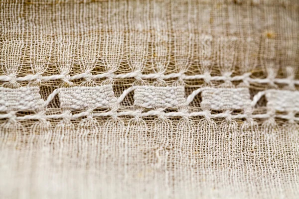Textura têxtil vintage com belo bordado — Fotografia de Stock