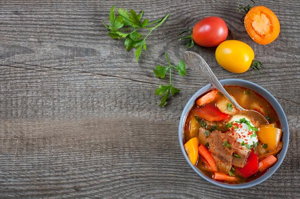 Traditional hungarian dish bograch goulash, top view — Stock Image Traditional hungarian dish bograch goulash, top view Royalty Free Stock Images