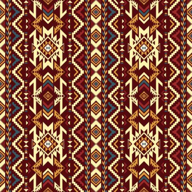 Karmaşık geometrik kabile süsleri, elmaslar ve zengin bordo, altın, deniz mavisi ve krem rengi zigzag içeren yerli Amerikan tarzında ayrıntılı bir desen..