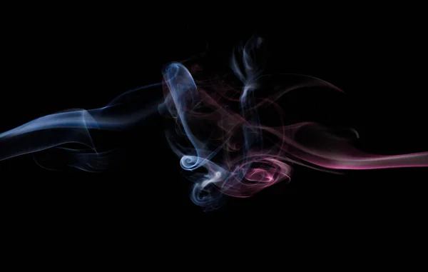 blue and red smoke on black background. fire design smoke on black background. fire design