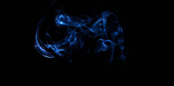 Blue smoke on black background. fire design smoke on black background. fire design