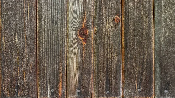 Fondo de madera marrón antiguo hecho de tableros verticales naturales con clavos en estilo grunge. Vista superior. Textura cepillada cruda de pino de coníferas. Superficie de la mesa para disparar plano laico. Copiar espacio. —  Fotos de Stock