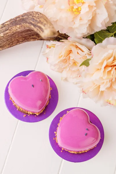 Heart shaped french pastry with pink glaze — Stock Photo, Image