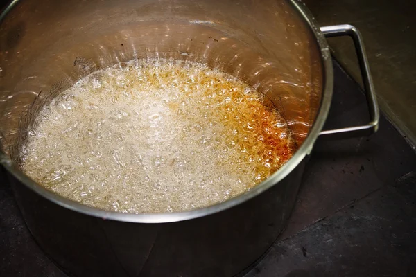 Boiling sugar caramel — Stock Photo, Image